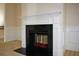 Elegant fireplace with black granite surround at 168 Waypoint Dr, Stockbridge, GA 30281