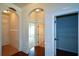 Bright hallway with access to bedrooms, garage and pantry at 168 Waypoint Dr, Stockbridge, GA 30281