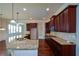 Modern kitchen featuring granite countertops and stainless steel appliances at 168 Waypoint Dr, Stockbridge, GA 30281