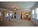 Open living room with views into kitchen and dining areas at 168 Waypoint Dr, Stockbridge, GA 30281