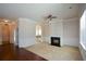 Living room featuring hardwood floors and fireplace at 168 Waypoint Dr, Stockbridge, GA 30281