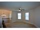 Bright loft area with bay windows and ceiling fan at 168 Waypoint Dr, Stockbridge, GA 30281