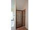 Walk-in shower with glass enclosure and tile surround at 168 Waypoint Dr, Stockbridge, GA 30281