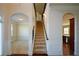 Elegant staircase leading to the second floor at 168 Waypoint Dr, Stockbridge, GA 30281