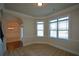 Study with bay window, crown molding, and neutral color palette at 168 Waypoint Dr, Stockbridge, GA 30281