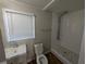 Updated bathroom with walk-in shower and modern vanity at 1965 Meadow Ln, Decatur, GA 30032