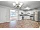 Eat-in kitchen with granite countertops and stainless steel appliances at 6170 Queensdale Dr, Douglasville, GA 30135