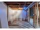 Unfinished basement with exposed utilities and concrete floor at 2683 Rockcliff Se Rd, Atlanta, GA 30316