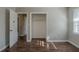 Simple bedroom with wood-look flooring and a large closet at 2683 Rockcliff Se Rd, Atlanta, GA 30316