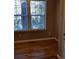 Hardwood floors and two large windows with backyard views at 275 Haas Se Ave, Atlanta, GA 30316