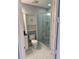 Small bathroom with a walk-in shower and white vanity at 711 Cosmopolitan Ne Dr # 426, Atlanta, GA 30324