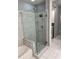 Elegant bathroom with a frameless glass shower and marble tile at 711 Cosmopolitan Ne Dr # 426, Atlanta, GA 30324