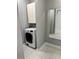 Convenient laundry room with washer, dryer, and storage cabinets at 711 Cosmopolitan Ne Dr # 426, Atlanta, GA 30324