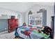 bedroom with a superhero theme and a large window at 2555 Flat Shoals Rd # 1801, Atlanta, GA 30349