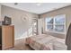 Well-lit bedroom with neutral walls and carpet flooring at 2555 Flat Shoals Rd # 1801, Atlanta, GA 30349