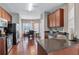 Kitchen boasts stainless steel appliances and dark wood cabinets at 2555 Flat Shoals Rd # 1801, Atlanta, GA 30349