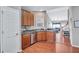 Kitchen features stainless steel appliances and a view of the living room at 2555 Flat Shoals Rd # 1801, Atlanta, GA 30349