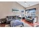 Spacious living room featuring hardwood floors and ample natural light at 2555 Flat Shoals Rd # 1801, Atlanta, GA 30349