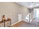 Upstairs hallway with carpet, access to bedrooms, and storage at 2555 Flat Shoals Rd # 1801, Atlanta, GA 30349