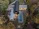 Expansive aerial view showcasing a contemporary home, pool, and lush landscape at 2716 Ridgewood Nw Rd, Atlanta, GA 30327