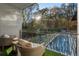 Relaxing balcony overlooking a private pool and tranquil wooded area at 2716 Ridgewood Nw Rd, Atlanta, GA 30327
