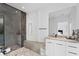 Contemporary bathroom with a large walk-in shower and modern vanity at 2716 Ridgewood Nw Rd, Atlanta, GA 30327