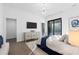 Bright bedroom with ample natural light and a built-in media console at 2716 Ridgewood Nw Rd, Atlanta, GA 30327
