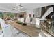 Bright dining room with a glass-top table and views of the kitchen at 2716 Ridgewood Nw Rd, Atlanta, GA 30327