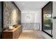 Elegant hallway with large artwork and wood console table at 2716 Ridgewood Nw Rd, Atlanta, GA 30327
