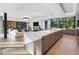 Open concept kitchen features marble island and flows into living room at 2716 Ridgewood Nw Rd, Atlanta, GA 30327