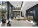 Sunlit living room with fireplace and expansive windows at 2716 Ridgewood Nw Rd, Atlanta, GA 30327