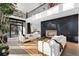 Bright living room featuring a fireplace and contemporary furniture at 2716 Ridgewood Nw Rd, Atlanta, GA 30327