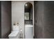 Chic powder room with unique tile and a pedestal sink at 2716 Ridgewood Nw Rd, Atlanta, GA 30327