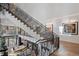 Modern staircase with metal railing and hardwood treads at 2716 Ridgewood Nw Rd, Atlanta, GA 30327