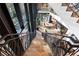 Modern staircase with metal railings overlooking a spacious living area at 2716 Ridgewood Nw Rd, Atlanta, GA 30327