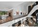 Stunning upper hallway showcasing a modern staircase and art at 2716 Ridgewood Nw Rd, Atlanta, GA 30327