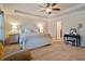 Spacious main bedroom with ceiling fan and large windows at 3050 Pleasant Valley Trl, Cumming, GA 30028