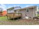 Backyard with a wooden deck and grassy area at 3900 Emerald North Dr, Decatur, GA 30035