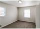 Spacious bedroom with two large windows and soft, neutral-toned carpet at 3900 Emerald North Dr, Decatur, GA 30035