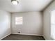 Well-lit bedroom featuring neutral-colored walls and carpeting at 3900 Emerald North Dr, Decatur, GA 30035