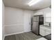 Modern kitchen with stainless steel appliances and white cabinetry at 3900 Emerald North Dr, Decatur, GA 30035