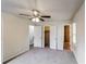 Large main bedroom with ceiling fan, carpeted flooring, and ensuite bathroom at 3900 Emerald North Dr, Decatur, GA 30035