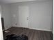 Bathroom with damaged walls and a new bathtub at 4922 Rock Springs Rd, Lithonia, GA 30038