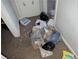 Hallway with discarded trash and debris on the floor at 4922 Rock Springs Rd, Lithonia, GA 30038