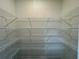 Walk-in pantry with ample shelving for storage at 1356 Creekside Nw Cir, Atlanta, GA 30318