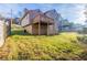 House's backyard with deck and grassy yard at 223 Clydesdale Se Ln, Mableton, GA 30126