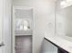Bathroom with a view into bedroom and double vanity at 318 Emporia Loop, Mcdonough, GA 30253