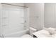 Clean bathroom with a tub and shower at 318 Emporia Loop, Mcdonough, GA 30253