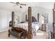 Spacious main bedroom with a large bed and ceiling fan at 318 Emporia Loop, Mcdonough, GA 30253