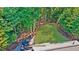 Elevated view of backyard with hot tub at 7802 Bamby Rd, Cumming, GA 30041